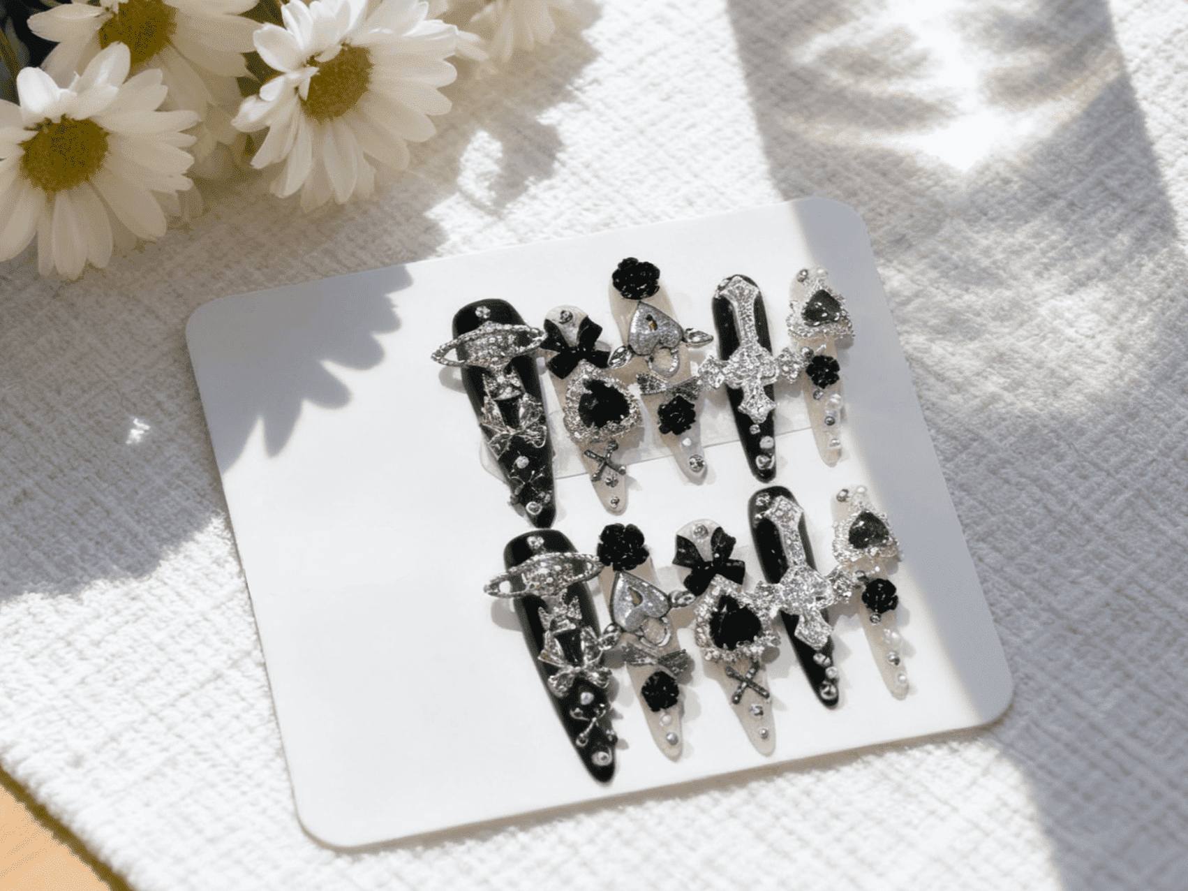 Fashion - Forward Long Stiletto Press-on Nails with Black and White Color and Decor Elements