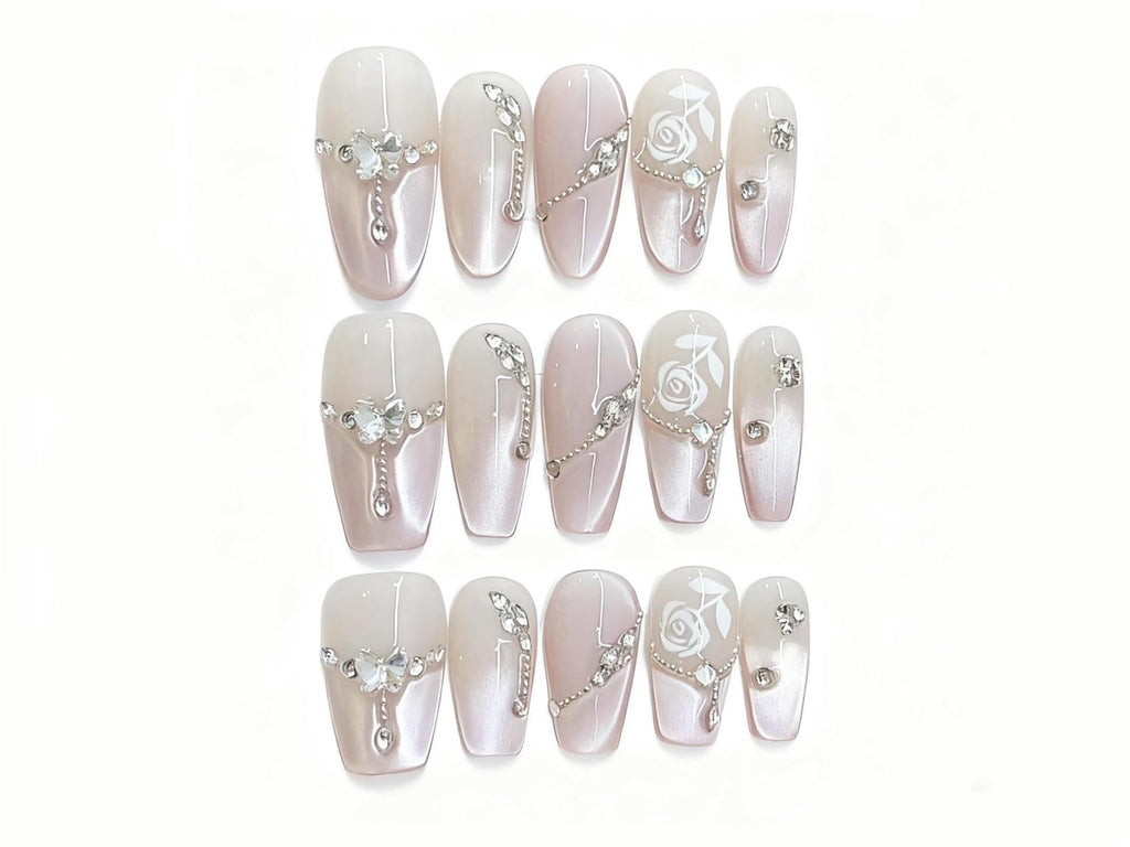 Classy Gradient Pink Press-on Nails with Delicate Rose Art and Shiny Details for a Sophisticated Look