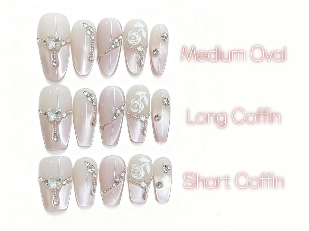 Classy Gradient Pink Press-on Nails with Delicate Rose Art and Shiny Details for a Sophisticated Look