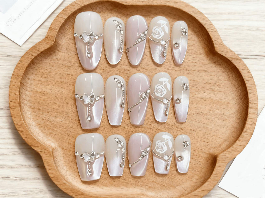 Classy Gradient Pink Press-on Nails with Delicate Rose Art and Shiny Details for a Sophisticated Look
