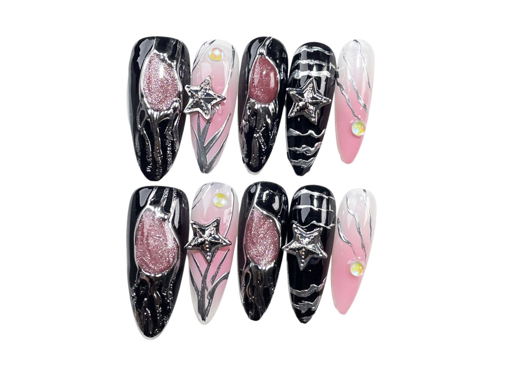 Bold Black and Pink Long Almond Press-on Nails, Star Accents & Artistic Silver Detailing for Unique Style
